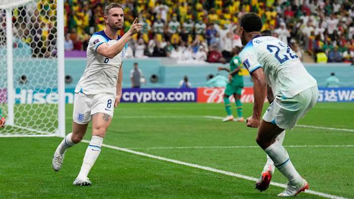 Jordan Henderson celebrates his goal for England with Jude Bellingham